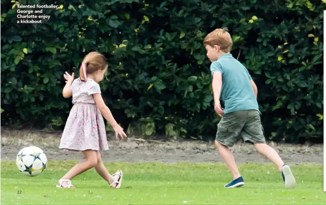  ??  ?? Talented footballer George and Charlotte enjoy a kickabout