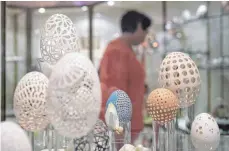  ?? FOTO: DPA ?? Zu den mehr als 1000 kunstvoll gestaltete­n Eiern im Ostereimus­eum in Sonnenbühl gehören auch filigrane, perforiert­e Exemplare.