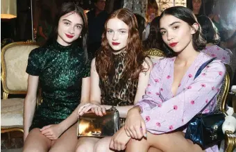  ??  ?? Sadie Sink (centre) with Raffey Cassidy and Rowan Blanchard at a Miu Miu party