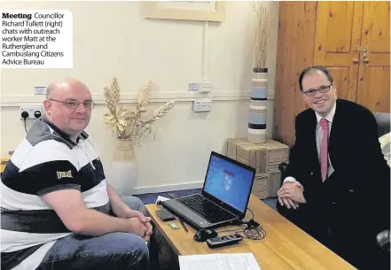  ??  ?? Meeting Councillor Richard Tullett (right) chats with outreach worker Matt at the Rutherglen and Cambuslang Citizens Advice Bureau