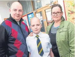  ?? Picture: Steven Brown. ?? Benny Jefferson with dad Ally and mum Clare.