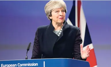  ?? AP ?? In this December 4, 2017 photo, British Prime Minister Theresa May speaks during a media conference at EU headquarte­rs in Brussels.