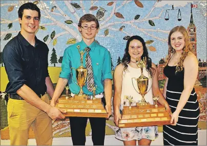  ?? ERIC MCCARTHY/JOURNAL PIONEER ?? Mackenzie Brennan, second left, and Rickilee MacLeod, second right, are the 2016-17 Westisle Composite High School athletes of the year. The 2015-16 athletes of the year, Connor Herget and Nonie Lyon, presented the awards. See page B2 for a list of awards.