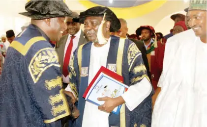  ??  ?? Former President Goodluck Jonathan (left) and former Head of State, Gen. Yakubu Gowon (rtd), after they were both awarded honorary doctorate degrees by Bingham University in Nasarawa State yesterday Photo: Bingham University