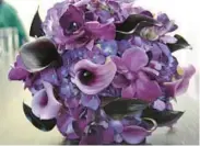  ?? LITTLE HOUSE OF FLOWERS ?? Martha D’Onofrio, who owns the Anne Arundel County flower shops Little House of Flowers and Always Blooming Florist & Boutique, has fielded requests for darker flowers in bridal bouquets. She sometimes uses deep-hued “Odessa” calla lilies and dark purple orchids.