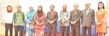  ??  ?? Invited guests in a group photo with Azhar (centre) and Asnimar (fourth left). Also seen is Pengiran Saifuddin (second right).