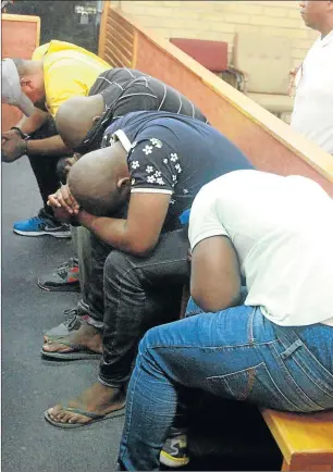  ?? Picture: LULAMILE FENI ?? IN THE DOCK: Kholwana Ntanjana, Vuyo Mahlombe, Mncedi Fasi and Monelisi Fasi appeared in the Mthatha Magistrate’s Court yesterday to apply for bail. They face four counts of murder and five of attempted murder related to recent outbreaks of taxi...