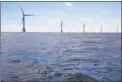  ?? Eric Thayer / Bloomberg ?? The GE-Alstom Block Island Wind Farm stands in the water off Block Island, Rhode Island.