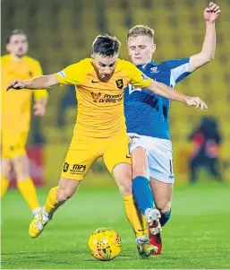  ?? SNS. ?? Livi’s Scott Pittman, top, fires home the only goal of the game; right: Liam Craig and Jason Kerr go up against Lyndon Dykes; above: Ali McCann challenges Steven Lawless.