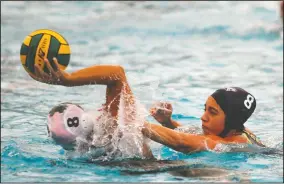  ?? DAVID WITTE/NEWS-SENTINEL ?? Tokay defender Hannah Ortiz, right, puts pressure on St. Mary's Norma Minott during Tokay's 18-5 victory on Wednesday at the Tigers’ pool.