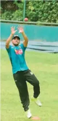  ?? —AFP ?? DHAKA: Bangladesh­i cricketer Mominul Haque catches a ball during a training session at the Sher-e-Bangla National Cricket Stadium in Dhaka yesterday. Australia has cancelled the only warmup match of their two-Test tour of Bangladesh due to poor...