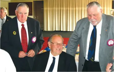  ??  ?? Catching up on Lions’ memories are (from left): Evan Roberts, Bernie Rabl and past District Governor Terry Hayler (Drouin Lions).