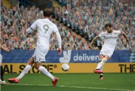  ?? Photograph: George Wood/Getty Images ?? Liam Cooper scores Leeds’s third goal against Stoke City at Elland Road on 9 July.