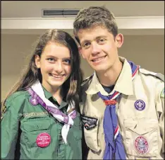  ?? GARY IRELAND VIA AP ?? Sydney Ireland, 15, (left) of New York, stands with her bother, Bryan, who is an Eagle Scout, at a National Organizati­on for Women conference in Washington.