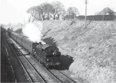  ?? S Rickard/J & J Collection ?? Long term Treherbert 0-6-2T No 5693 approaches Waterhall Junction with special working No 6. Leaving Pontypridd at 2pm, it was heading for Ninian Park Halt where its excited passengers would disgorge and make their way to the nearby stadium to see Cardiff City play Charlton Athletic on Saturday, 12 March 1955. With a 4-3 score line to the home side, it would be a noisy return trip. Waterhall Junction is south of Radyr in the Taff vale, where the Llantrisan­t No 1 branch joined from the west – its demise came on 28 September 1964 with the end of workings over the 4½ mile section of line from Creigiau Quarry.