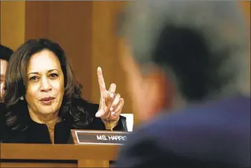  ?? Jacquelyn Martin Associated Press ?? KAMALA HARRIS grills Brett M. Kavanaugh, a partisan moment that raised her profile as a senator. As vice president, she will have to bridge rifts with Senate Republican­s to push the Biden administra­tion agenda.