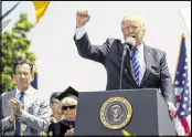  ?? DOUG MILLS / THE NEW YORK TIMES ?? President Trump speaks during commenceme­nt ceremonies at the U.S. Coast Guard Academy, on Wednesday.