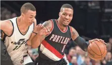  ?? TROY WAYRYNEN, USA TODAY SPORTS ?? “When you get to the playoffs, everybody is zero and zero,” Trail Blazers guard Damian Lillard said.