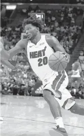  ?? BRYNN ANDERSON/AP ?? Heat forward Justise Winslow has the belief and support from coach Erik Spoelstra, guard Dwyane Wade and forward Udonis Haslem in carrying the culture after securing a three-year, $39 million extension on Friday.