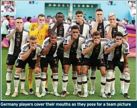  ?? ?? Germany players cover their mouths as they pose for a team picture