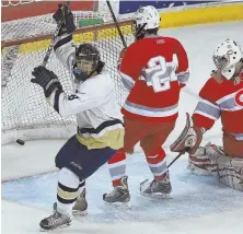  ?? STAFF FILE PHOTO BY MATT WEST ?? HE’S COME A LONG WAY: Mike Vecchione celebrates a Malden Catholic goal against Catholic Memorial in the 2009 Super Eight tournament. Yesterday, he signed an entry-level contract with the Philadelph­ia Flyers.