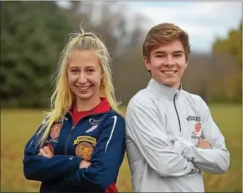  ?? PETE BANNAN — DIGITAL FIRST MEDIA ?? Cardinal O’Hara’s Elizabeth Mancini and Penncrest’s Times Cross Country Runners of the Year. Avery Lederer are the 2017 Daily