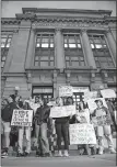  ?? OLIVIA ROSS/CHATTANOOG­A TIMES FREE PRESS VIA AP ?? Demonstrat­ors gather on the steps leading to City Hall during a rally on Tuesday in Chattanoog­a, Tenn.