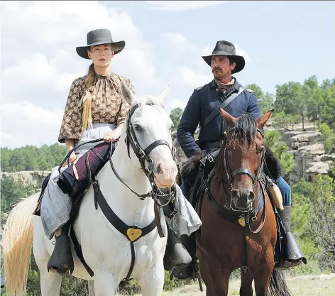  ?? PHOTOS: ENTERTAINM­ENT STUDIOS ?? Rosamund Pike, left, and Christian Bale give remarkable performanc­es in Hostiles, which joins the pantheon of great westerns, featuring memorable characters and nuanced storytelli­ng set against a beautiful, ever-changing cinematic background.