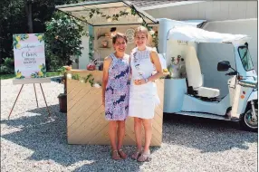  ?? Contribute­d photo ?? Cheryl Hodina, left, and her daughter, Olivia Hodina. Cheryl Hodina threw a bridal shower for her daughter and hired the Cork & Craft mobile prosecco and craft beer bar out of Branford.