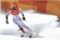  ?? THE ASSOCIATED PRESS ?? Mikaela Shiffrin of the United States skies into the finish area Thursday during the women’s giant slalom.