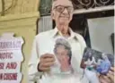  ??  ?? Indian restaurate­ur Boman Kohinoor, 93, an ardent fan of the British royal family, stands inside the Britannia & Co. restaurant in Mumbai on April 8, 2016, ahead of the royal visit of Britain’s Prince William and his wife Kate.