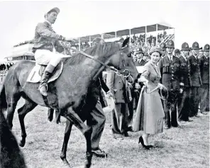  ?? ?? The Queen with one of her horses at Epsom, and, far left, her entry to the British Champions Hall of Fame