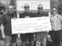  ?? Submitted photo ?? From left, Friso Stolk, Bernie Ryan, Adam Brockman and event organizer Emily McDonald hold a cheque for $22,000 they would present to the KGH Foundation.