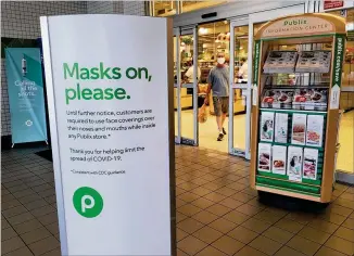  ?? MATT KEMPNER / MATTHEW.KEMPNER@AJC.COM ?? Publix stores are among major retailers in metro Atlanta that have recently set requiremen­ts for customers to wear masks in stores.