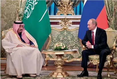  ?? AFP ?? Russian President Vladimir Putin meets with Saudi Arabia’s King Salman bin Abdulaziz at the Kremlin in Moscow on Thursday. —