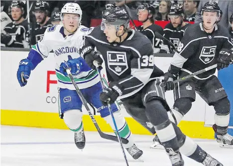  ?? REED SAXON/THE ASSOCIATED PRESS ?? Canucks forward Brock Boeser, chasing the Kings’ Adrian Kempe in Los Angeles on Saturday, has had a standout debut to the pre-season, scoring the overtime winner against the Kings and adding two more goals Sunday against Vegas in Vancouver.