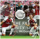  ??  ?? Wembley joy: Arsenal celebrate with the Community Shield