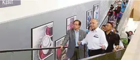  ?? FILE PIC ?? Sarawak Chief Minister Datuk Patinggi Abang Johari Abang Openg and Mydin managing director Datuk Dr Ameer Ali Mydin at the opening of Mydin Petra Jaya in Kuching last month.