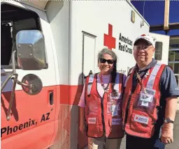  ?? JASON POHL/THE REPUBLIC ?? Connie and David Icenhower spent Saturday morning packing their bags and inspecting a truck bound for Houston to assist in emergency efforts after Hurricane Harvey.