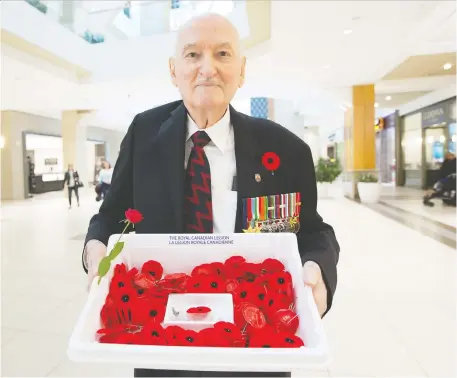  ?? WAYNE CUDDINGTON ?? Second World War veteran Art Boudreau, 99, has been selling poppies at Bayshore Shopping Centre in advance of Remembranc­e Day for 35 years. He plans to celebrate his 100th birthday with his family in February at the Royal Canadian Legion branch in Bells Corners.