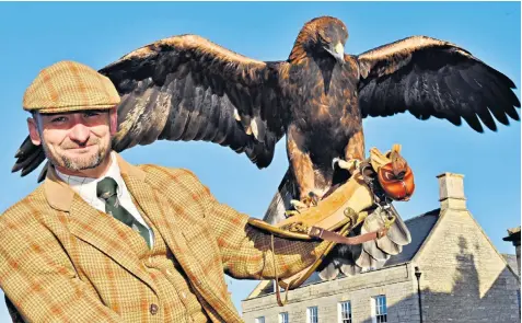  ??  ?? John Mease, a member of the Fitzwillia­m Hunt, was cleared of breaching fox hunting laws because he uses a bird of prey instead of a pack of hounds