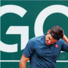  ??  ?? ROGER Federer reacts during his round of 16 match against Spain’s Pablo Andujar. | DENIS BALIBOUSE Reuters