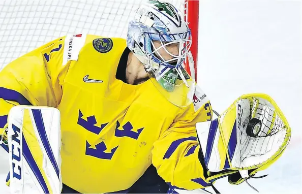  ?? — GETTY IMAGES FILES ?? Anders Nilsson helped backstop Sweden to world championsh­ip gold Sunday after a rough NHL season in Vancouver.