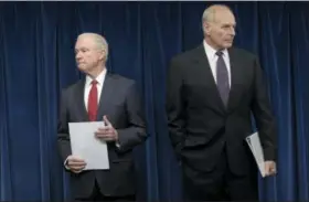  ?? SUSAN WALSH — THE ASSOCIATED PRESS ?? Attorney General Jeff Sessions, left, and Homeland Security Secretary John Kelly wait to make a statements on issues related to visas and travel Monday atthe U.S. Customs and Border Protection office in Washington.