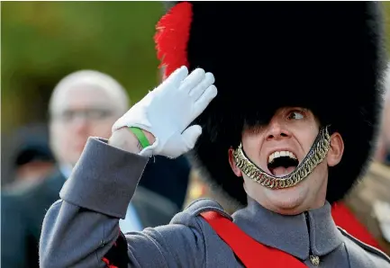  ?? PHOTO: REUTERS ?? A soldier salutes as he parades during the Remembranc­e Sunday Cenotaph service in London.