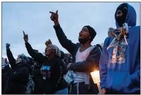  ?? (AP/John Minchillo) ?? People were gathered Thursday at the Police Department in Brooklyn Center, Minn., for another protest over the fatal police shooting of Daunte Wright.