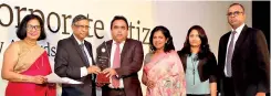  ??  ?? SLT General Manager Rohana Ellawala receives the award with SLT Deputy General Manager Nilanthi Jayakody, SLT Assistant Manager Nilmini Wijesinghe and SLT Manager Chandima Dharmadasa