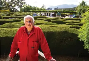  ??  ?? Brian Inder at the centre of the Hampton Court Maze, with Lower Crackpot behind and Mount Roland in the distance.