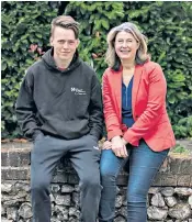  ??  ?? Thriving: Anna Firth and her privately educated son, Piers