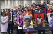  ?? J. SCOTT APPLEWHITE/THE ASSOCIATED PRESS ?? From left, Rep. Veronica Escobar, D-Texas, Rep. Judy
Chu, D-Calif., House Speaker Nancy Pelosi of Calif., Rep. Jimmy Gomez, D-Calif., and Rep. Carolyn Maloney, D-N.Y., attend an event on the steps of the U.S. Capitol about gun violence on Friday.